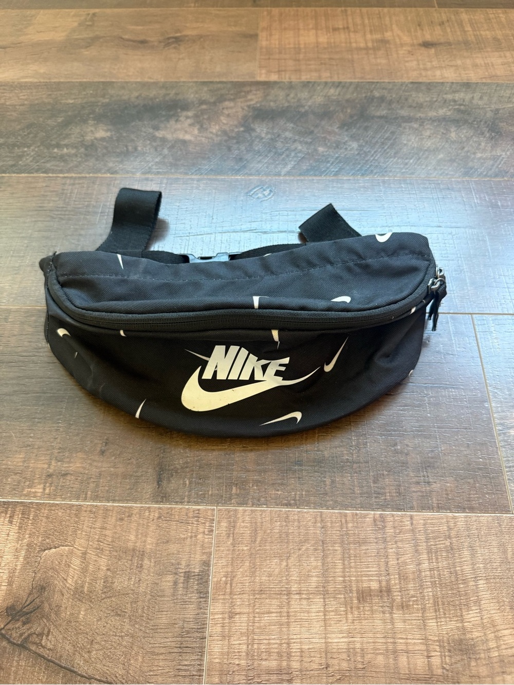 Nike Black Waist Pack with White Swoosh Pattern
